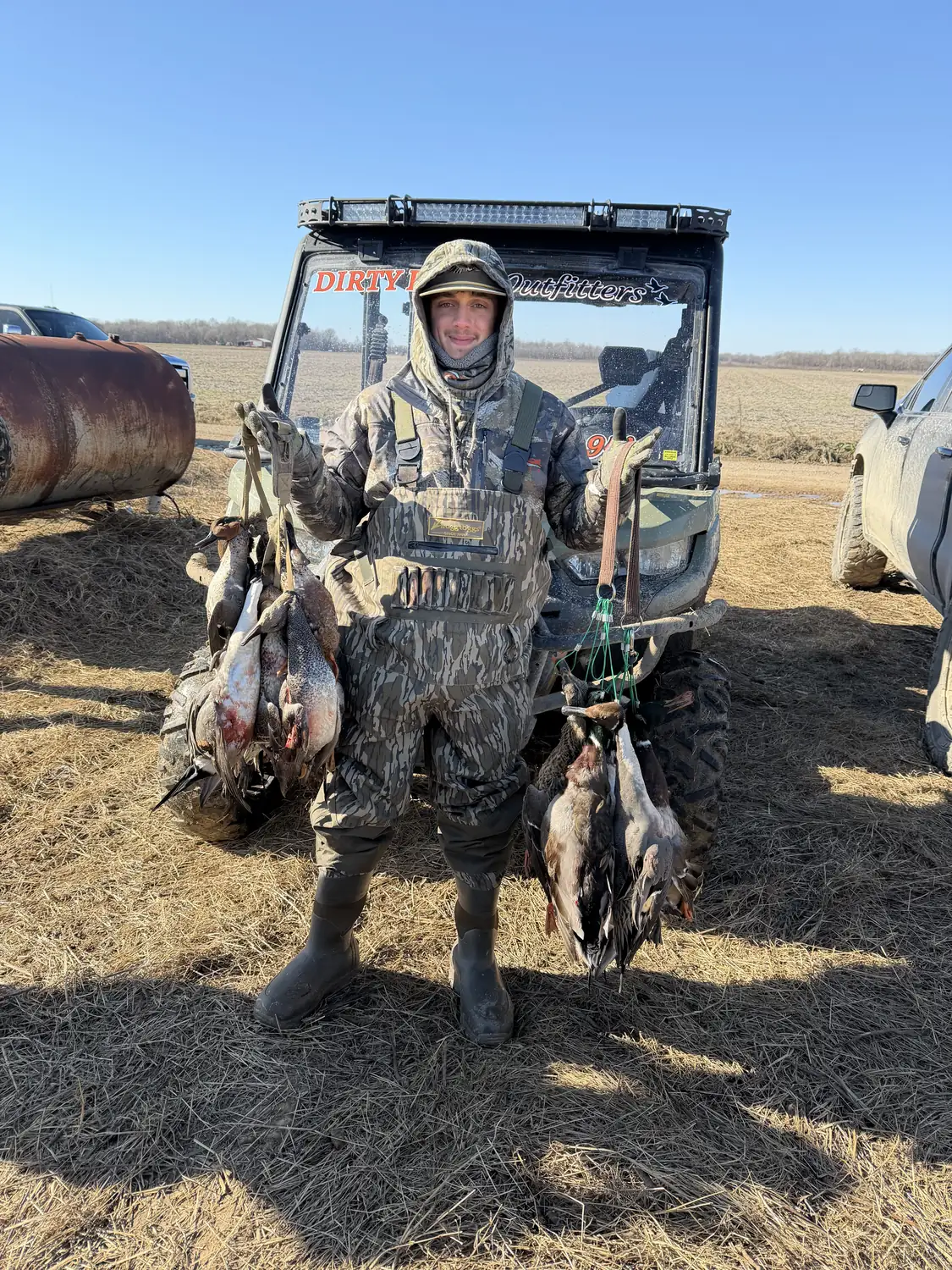 Morning limit of ducks laid across the UTV back at the truck